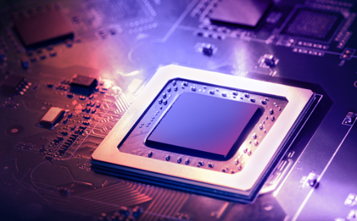 Close-up of a high-tech PCB with a central processor symbolizing AI integration in embedded systems